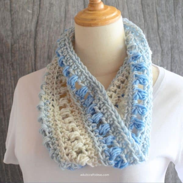 Blue and white crochet cowl.