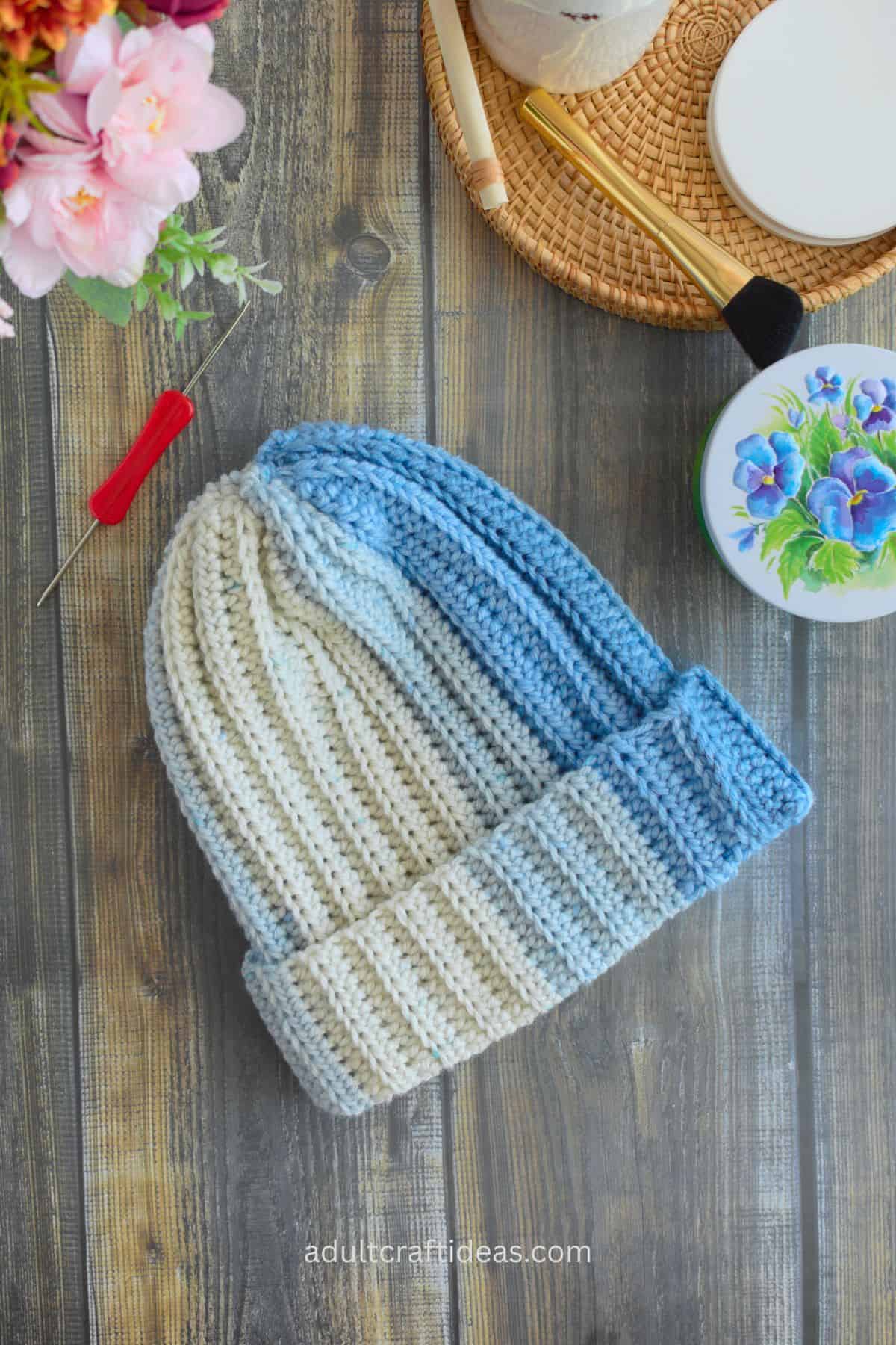 Blue and white ribbed crochet hat.