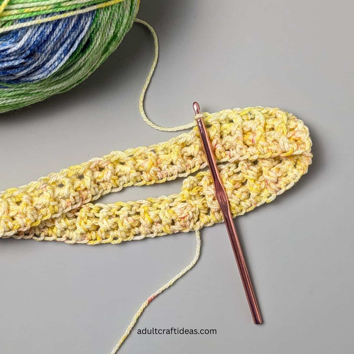 A yellow crochet band for a slouchy beanie.